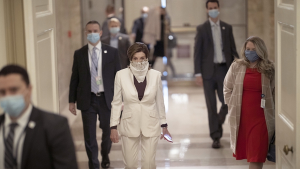 US House Speaker Nancy Pelosi arrives for the vote on the $484bn coronavirus rescue package