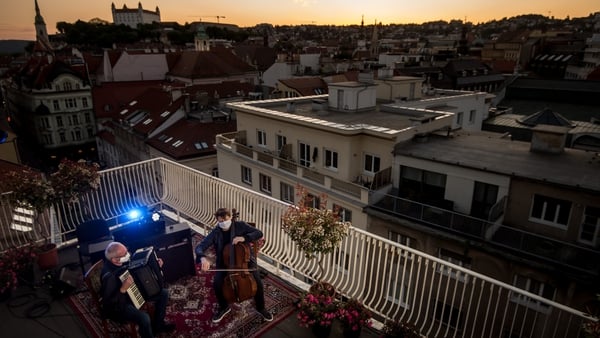 Musicians perform on a terrace of the Municipal Theatre during an online streamed concert in Bratislava