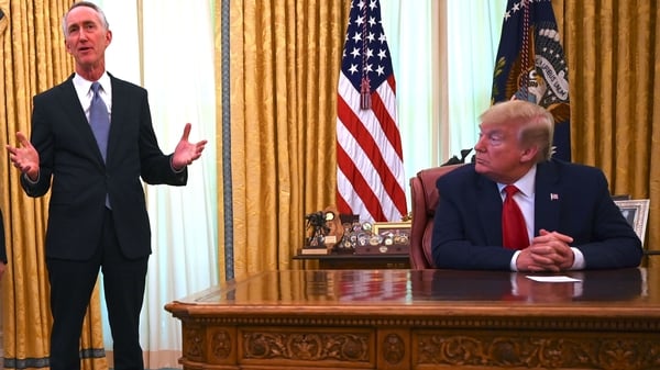 Gillead Sciences CEO Daniel O'Day speaks during a meeting with US President Donald Trump in the Oval Office of the White House