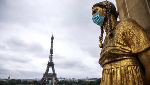 The golden statues of the Trocadero esplanade, in front of the Eiffel Tower, in Paris