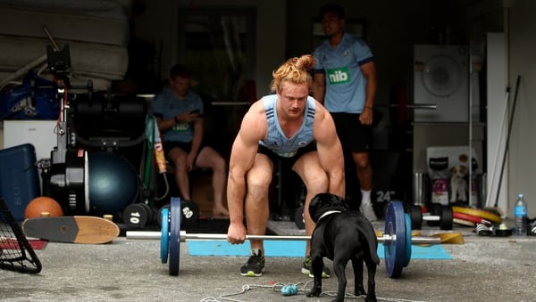 Flatmates and team-mates Stephen Perofeta, Finlay Christie and Tom Robinson of the Blues pictured during a weights session in their Auckland garage