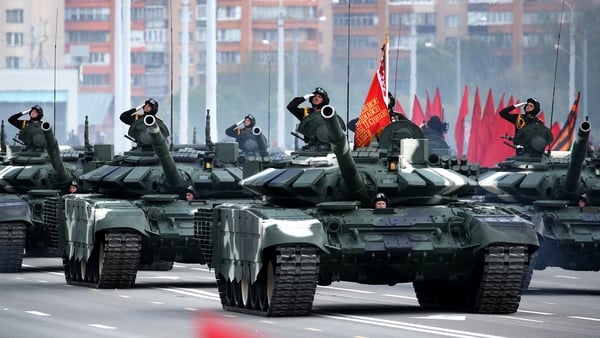 Thousands of troops parade before crowds in Belarus