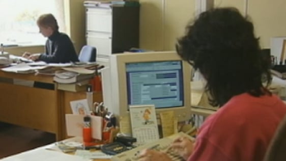 Civil servants working in an office (2000)