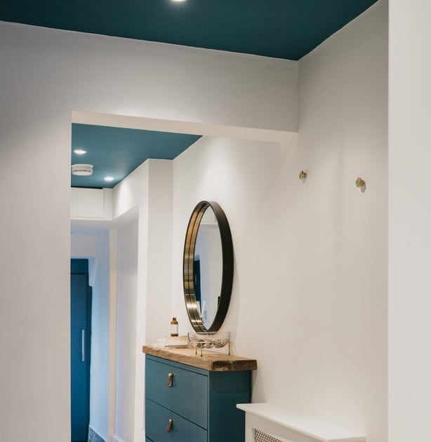 A coloured ceiling draws the eye up and creates interest (The Furniture Union/PA)