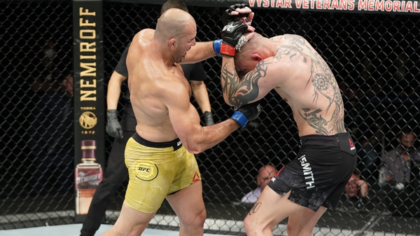 Glover Teixeira (left) catches Anthony Smith in their light heavyweight bout