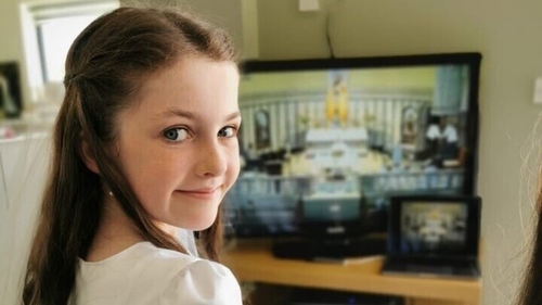 Laoise O'Kelly made her communion at home via video link