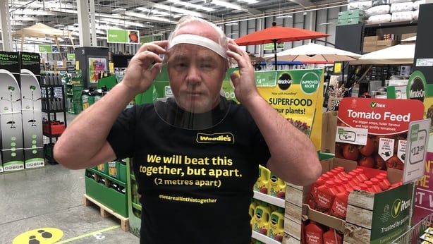 Woodies worker Noel Mulqueen tries his visor for size