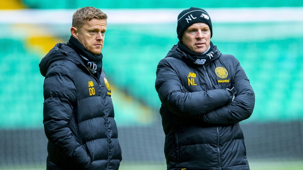 Celtic manager Neil Lennon (R) and first-team coach Damien Duff