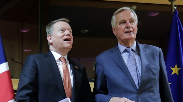 European Union chief Brexit negotiator Michel Barnier (R) and the British Prime Minister's Europe adviser David Frost
