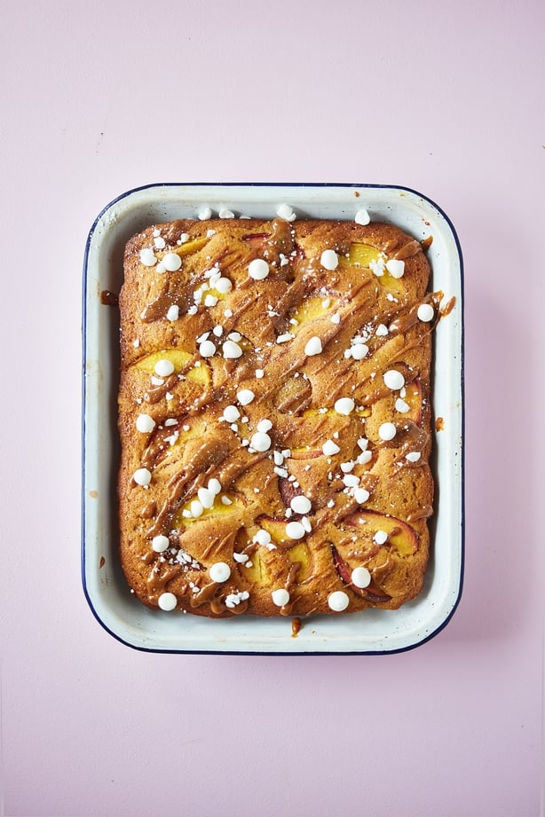 Peach and dulce de leche cake with meringues and cream from The Roasting Tin Around The World by Rukmini Iyer (David Loftus/PA)