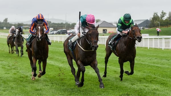 Siskin and Colin Keane (pink cap) triumph in the Keenland Phoenix Stakes