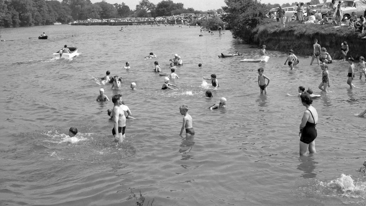 People taking a Whit Sunday dip in 1960: 