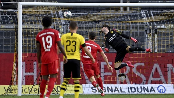 Borussia Dortmund goalkeeper Roman Buerki is beaten by Joshua Kimmich's brilliance