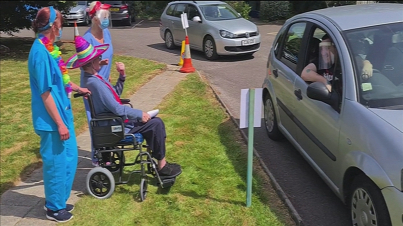 Drive-through visits bring cheer to care home residents