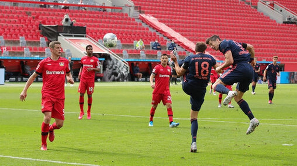 Robert Lewandowski heads home Bayern's fourth