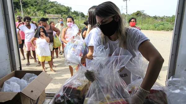Volunteers organizing food donations for residents Sao Goncalo, Brazil