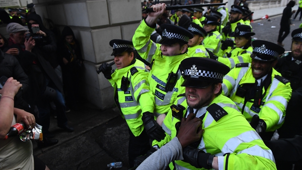 Police clash with protesters during a Black Lives Matter march in London today