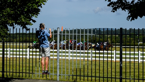 A punter looks on during the action at Naas