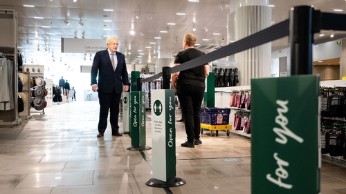 Made to measure: British prime minister Boris Johnson in a Marks & Spencer store in London in June
