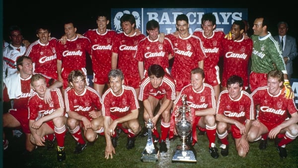Liverpool FC pose with the league title after being crowned 1989/90 league champions