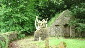 The sculpture by Victor Segoffin was commissioned by Baron Edward O'Neill and his wife Louisa to mark the death in WW1 of their son Arthur O'Neill "and the men of the district who fell with him." It is now located in the family graveyard at Shane's Castle