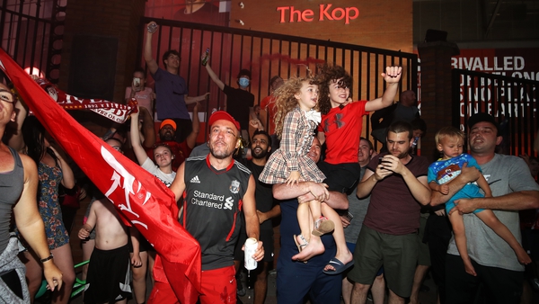 Liverpool fans celebrate outside Anfield