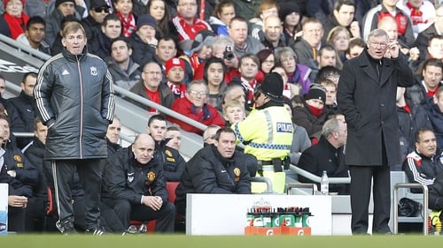 Then Liverpool manager Kenny Dalglish (L) and Manchester United manager Alex Ferguson on the touchline in 2012