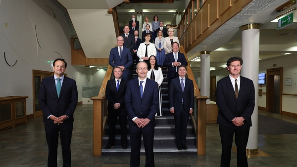 The new cabinet pose for a socially distant snap: 