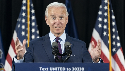 Biden raises more funds than Trump for second month