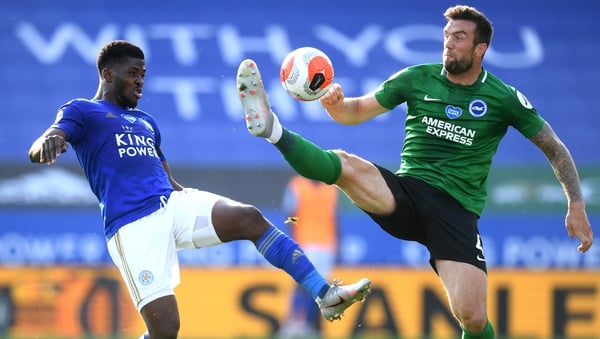 Shane Duffy (R) battles with Kelechi Iheanacho of Leicester City