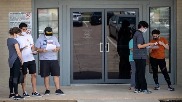 People wearing face masks in Texas