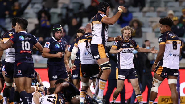 Darcy Swain of the Brumbies celebrates after Will Miller's try