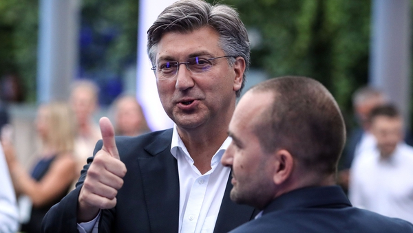 Croatian Prime Minister Andrej Plenkovic reacting to the exit poll showing his HDZ party has outperformed its rivals