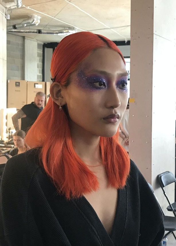 Bright glittery eyes, as seen on a model backstage at House of Holland SS20 (Katie Wright/PA)