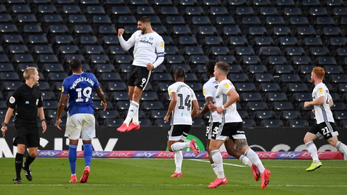 Aleksandar Mitrovic (C) celebrates scoring Fulham's first goal