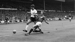 Tackling Wolfgang Weber in the 1966 World Cup final