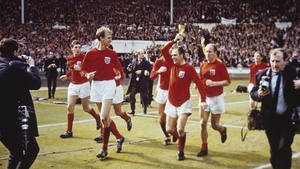 Celebrating with the Jules Rimet trophy on the Wembley turf (Picture credit: Hulton Archive)
