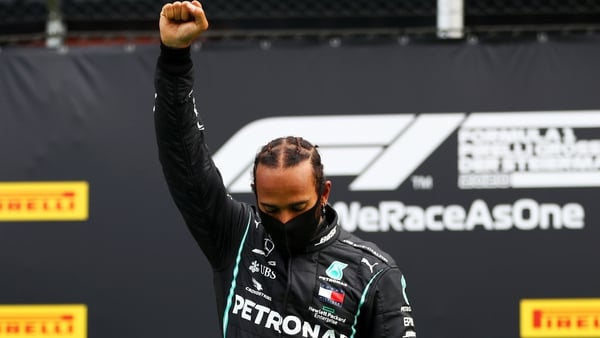 Lewis Hamilton raises a clenched fist in Spielberg