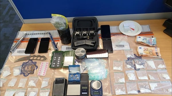 Gardaí recovered cocaine and cannabis with an estimated street value of €18,500 along with €980 in cash, weighing scales, mobile phones and a number of offensive weapons, including a stun gun Pic: @gardainfo