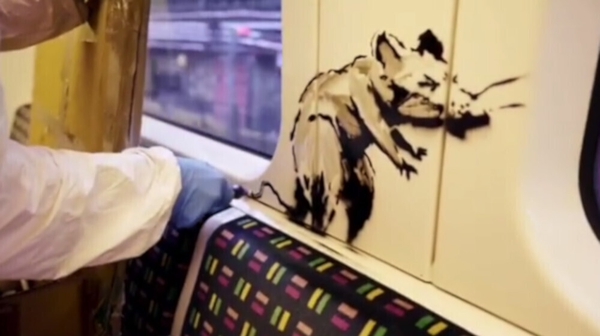 The video showed Banksy spray painting stencils of his famous rats on the Tube train