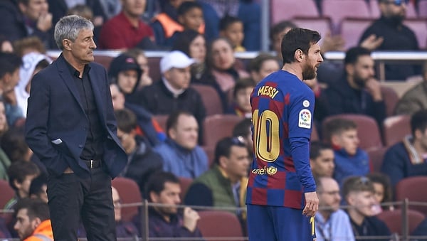 Lionel Messi (R) and Quique Setien
