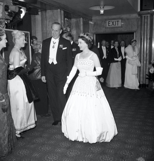 The Queen wearing the same Peau De Soie taffeta dress by Norman Hartnell for the world premiere of the film 'Lawrence of Arabia' in 1962