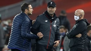 Liverpool manager Jurgen Klopp (R) and Chelsea manager Frank Lampard after the final whistle at Anfield