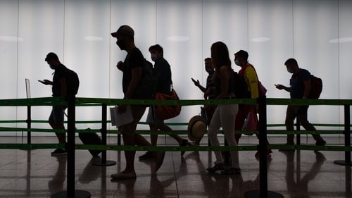 Travellers walk through Terminal 2 of the Josep Tarradellas Barcelona-El Prat Airport today