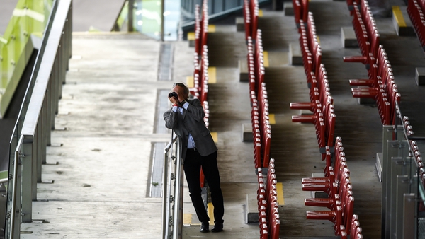 Trainer Tony Martin watches from the deserted stands at Ballybrit Racecourse