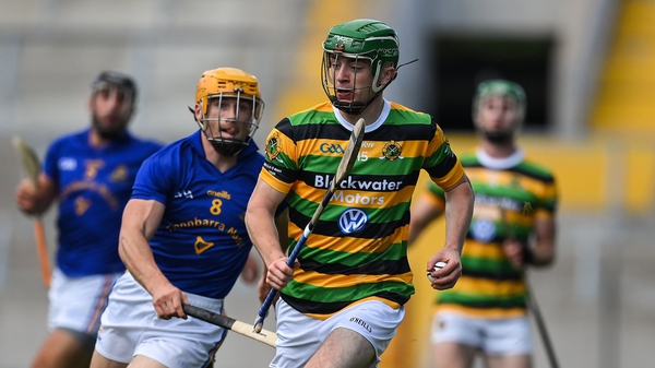 Glen Rovers' Liam Coughlan evades Billy Hennessy of St Finbarrs