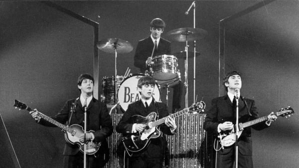 The Beatles at the height of their fame in the 1960s