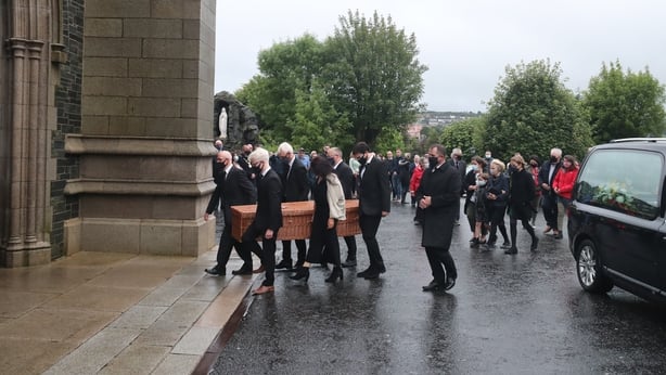 John Hume coffin at St Eugene's Cathedral