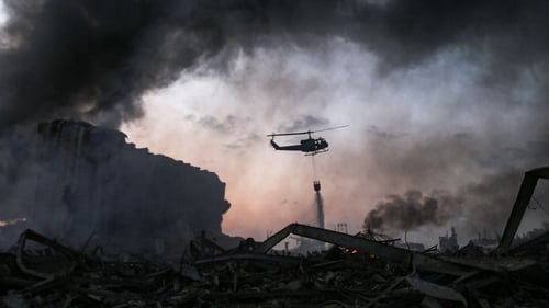 Helicopters are used to help douse the flames