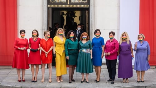 The lawmakers made a statement in brightly coloured clothes and rainbow masks, in a protest against Duda The lawmakers made a statement in brightly coloured clothes and rainbow masks, in a protest against Duda